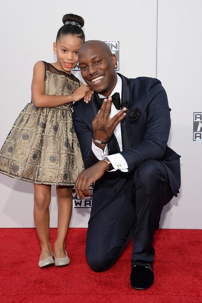 Tyrese Gibson And Shayla Somer Gibson Giving pose on Red Carpet